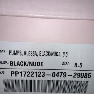 Women’s tan and black pumps